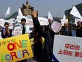 FOTO: Gema Satu Korea Sambut Pertemuan Kim Jong-un dan Moon