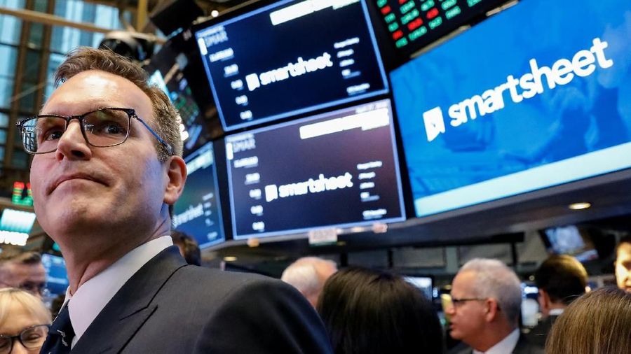 Smartsheet Inc. President and CEO Mark Mader attends his company's IPO on the floor of the New York Stock Exchange (NYSE) in New York, U.S., April 27, 2018. REUTERS/Brendan McDermid