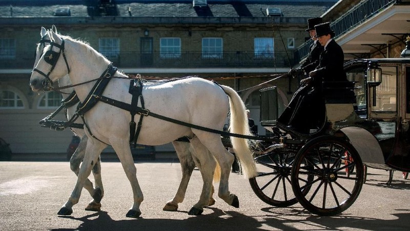 Pangeran Inggris Harry dan calon istrinya Meghan Markle memilih kereta kerajaan terbuka untuk perosesi menuju kastil Windsor.