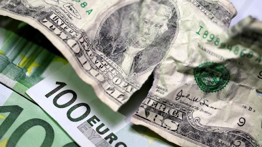 U.S. dollar and Euro banknotes are seen in this picture illustration taken May 3, 2018. REUTERS/Dado Ruvic/Illustration