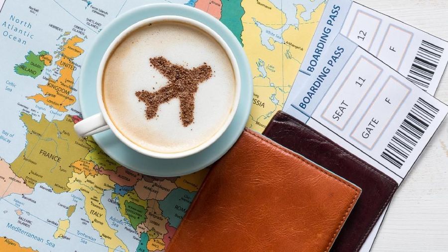 Europe map and airplane in cappuccino (made of cinnamon). Travel concept. Travel agency