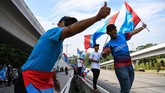 Selama menjabat sebagai perdana menteri, Mahathir identik dengan sosok diktator karena dianggap sebagai pimpinan garang dan melawan pihak-pihak yang menentangnya. (dok. AFP PHOTO / Manan VATSYAYANA)