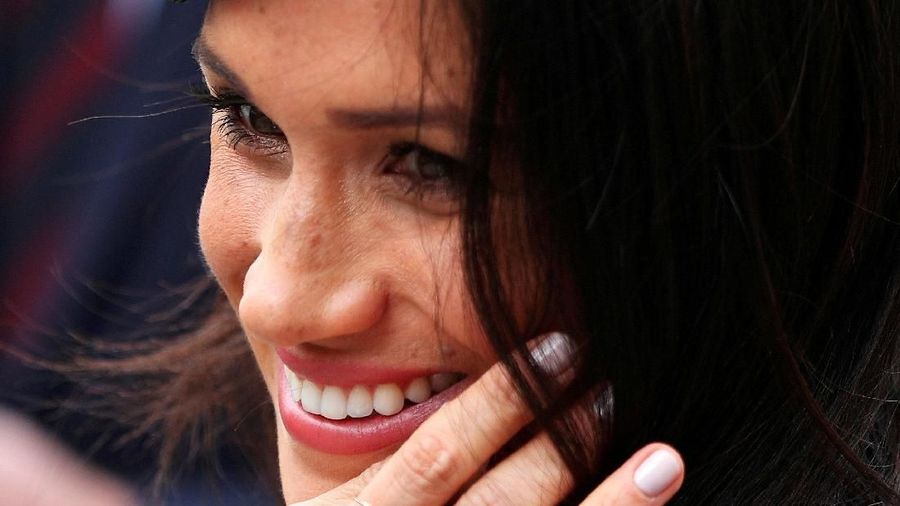 FILE PHOTO: Britain's Prince Harry's fiancee Meghan Markle leaves an ANZAC day service at Westminster Abbey in London, April 25, 2018. REUTERS/Hannah McKay