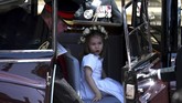Di antara anak-anak tersebut ada nama Pangeran George dan Putri Charlotte, anak pertama dan kedua dari Kate Middleton dan Pangeran William. (NEIL HALL/Pool via REUTERS)