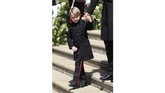 Saat pernikahan Pangeran Harry-Meghan Markle, Pangeran George memakai seragam militer hitam yang mirip dengan yang dipakai sang paman. (Brian Lawless/Pool via REUTERS)