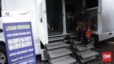 Layanan penukaran uang di IRTI Monas diselenggarakan oleh Bank Indonesia (BI) bekerja sama dengan 13 bank swasta maupun BUMN. (CNN Indonesia/ Hesti Rika)