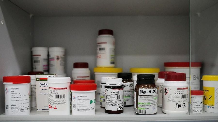 Containers with active ingredients are pictured in a laboratory at 