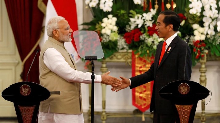 PM Narendra Modi & Indonesian President Joko Widodo at Joint Press Statement at the presidential palace in Jakarta. Image: Reuters/Darren Whiteside