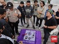 Polisi Aniaya Ketua AJI Palu Saat Razia Kendaraan