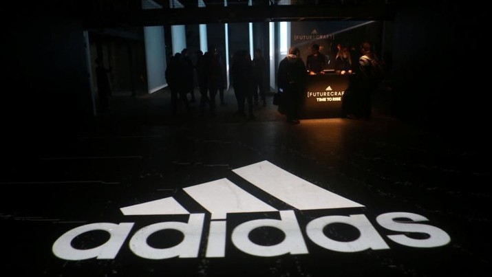 FILE PHOTO: An Adidas logo is seen at the new Futurecraft shoe unveiling event in New York City, New York, U.S. April 6, 2017. REUTERS/Joe Penney/File Photo