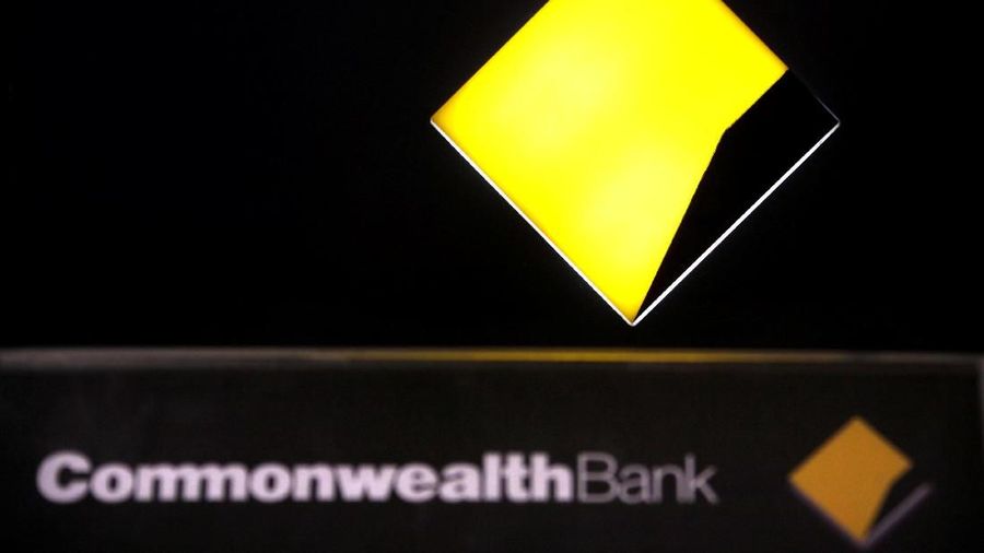 FILE PHOTO: A Commonwealth Bank logo adorns an Automatic Tellar Machine (ATM) located in Sydney, Australia November 12, 2014. REUTERS/David Gray/File Photo