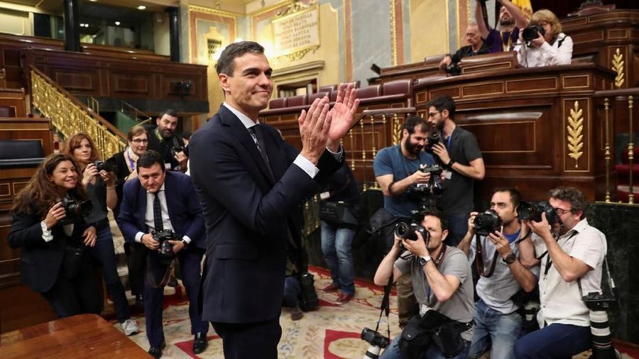 Spain's new Prime Minister and Socialist party (PSOE) leader Pedro Sanchez is surrounded by photographers after a motion of no confidence vote at parliament in Madrid, Spain, June 1, 2018. REUTERS/Sergio Perez