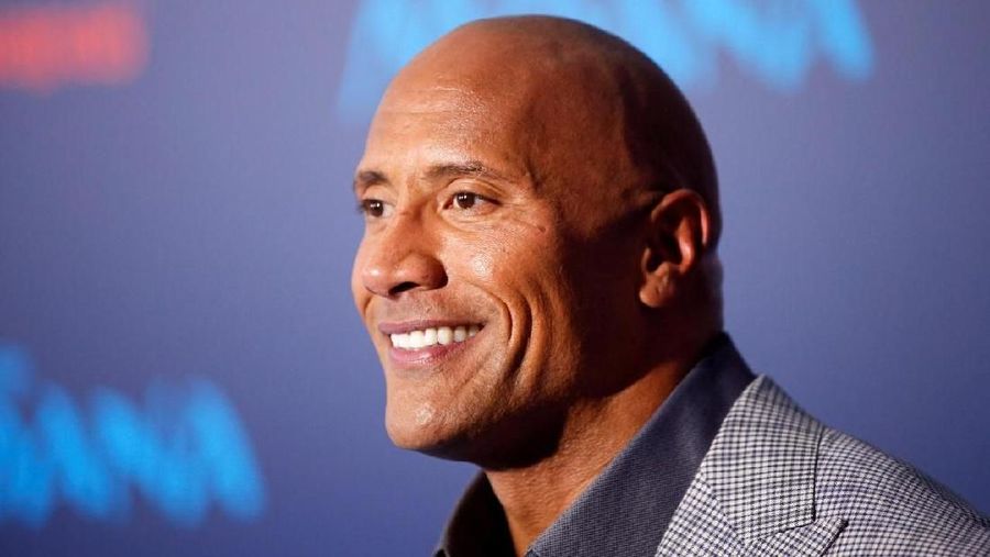Actor Dwayne Johnson poses at the world premiere of Walt Disney Animation Studios' 