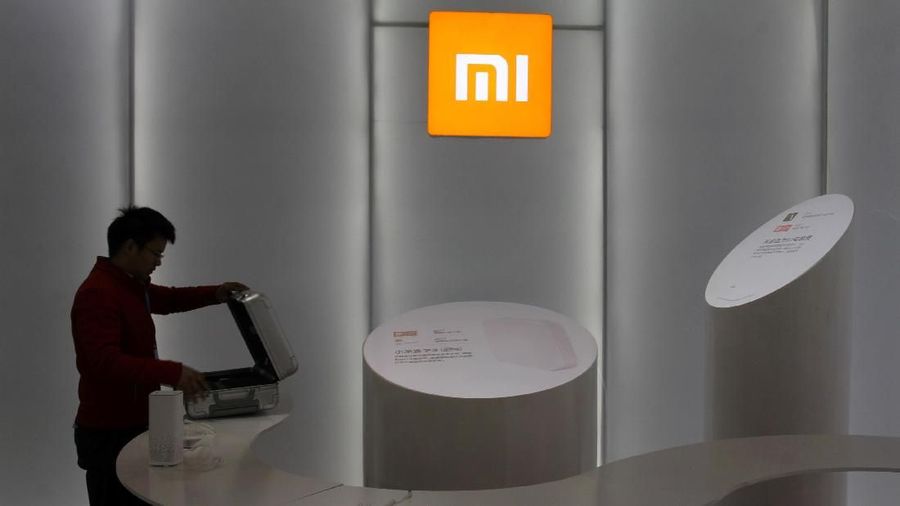 FILE PHOTO: A booth of Chinese smartphone maker Xiaomi is seen at an industrial design expo in Wuhan, Hubei province, China December 3, 2017.  REUTERS/Stringer/File Photo  ATTENTION EDITORS - THIS IMAGE WAS PROVIDED BY A THIRD PARTY. CHINA OUT.