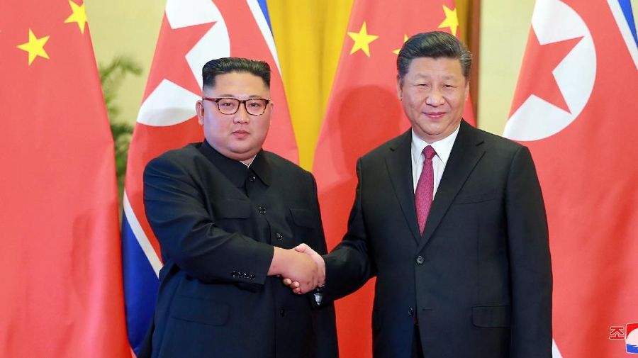 North Korean leader Kim Jong Un shakes hands with Chinese President Xi Jinping in Beijing, China, in this photo released June 20, 2018 by North Korea's Korean Central News Agency. KCNA via REUTERS ATTENTION EDITORS - THIS PICTURE WAS PROVIDED BY A THIRD PARTY. REUTERS IS UNABLE TO INDEPENDENTLY VERIFY THE AUTHENTICITY, CONTENT, LOCATION OR DATE OF THIS IMAGE. NO THIRD PARTY SALES.  SOUTH KOREA OUT. SOUTH KOREA OUT. NO COMMERCIAL OR EDITORIAL SALES IN SOUTH KOREA.