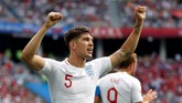 Stones merayakan golnya ke gawang Panama. Bek Manchester City itu mencetak dua gol sundulan di laga melawan Panama. (REUTERS/Matthew Childs)