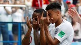 Jesse Lingard merayakan golnya ke gawang Panama. Ia adalah salah satu pemain terbaik di laga kali ini, menjadi sosok sentral dalam serangan Inggris. (REUTERS/Matthew Childs)