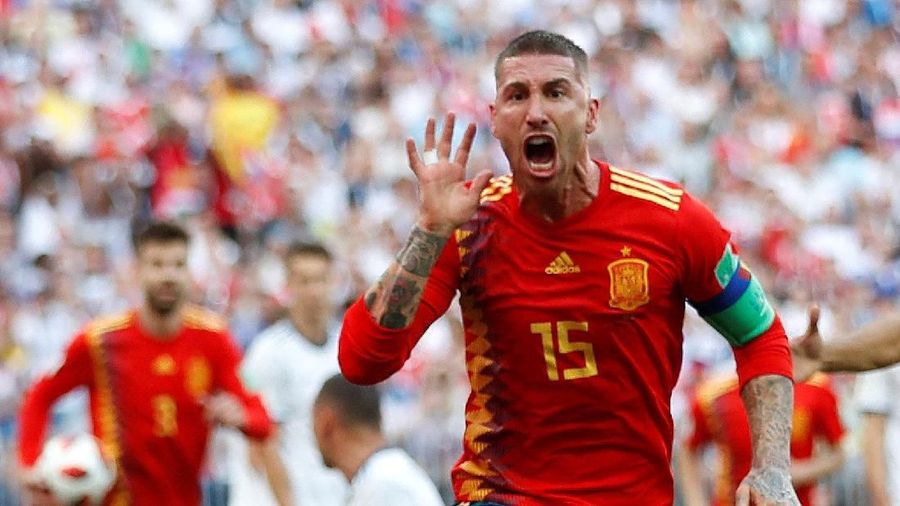 Soccer Football - World Cup - Round of 16 - Spain vs Russia - Luzhniki Stadium, Moscow, Russia - July 1, 2018 Spain's Sergio Ramos celebrates after Russia's Sergei Ignashevich scored an own goal and the first goal for Spain REUTERS/Carl Recine
