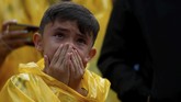 Duka membayang di wajah-wajah para fans timnas Kolombia. (REUTERS/Luisa Gonzalez)