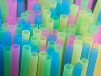 FILE PHOTO: Drinking straws protrude from a glass in a illustration picture in Loughborough, Britain April 19, 2018.  REUTERS/Darren Staples/File Photo