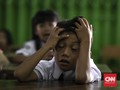 FOTO: Ekspresi Para Bocah di Hari Pertama Sekolah