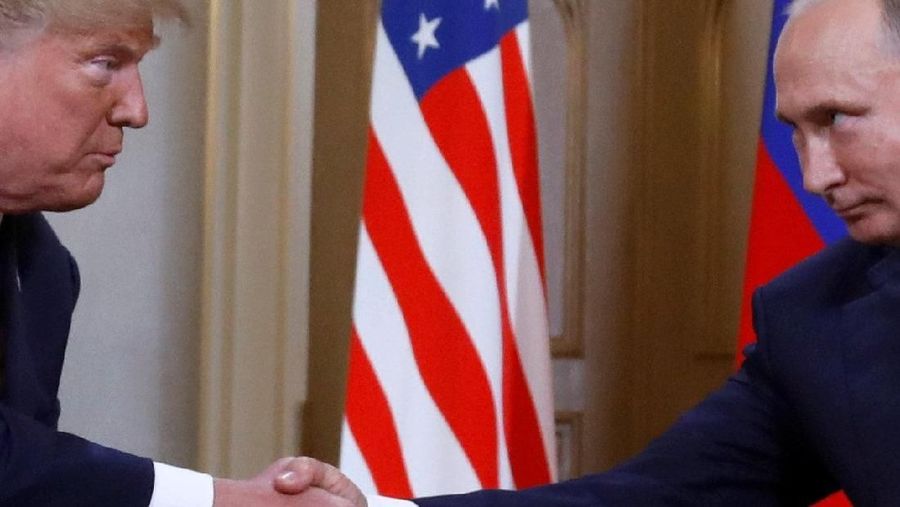 U.S. President Donald Trump and Russia's President Vladimir Putin shake hands as they meet in Helsinki, Finland July 16, 2018. REUTERS/Kevin Lamarque