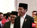 Senyum Jokowi ke Kapitra Ampera yang Jadi Caleg PDIP