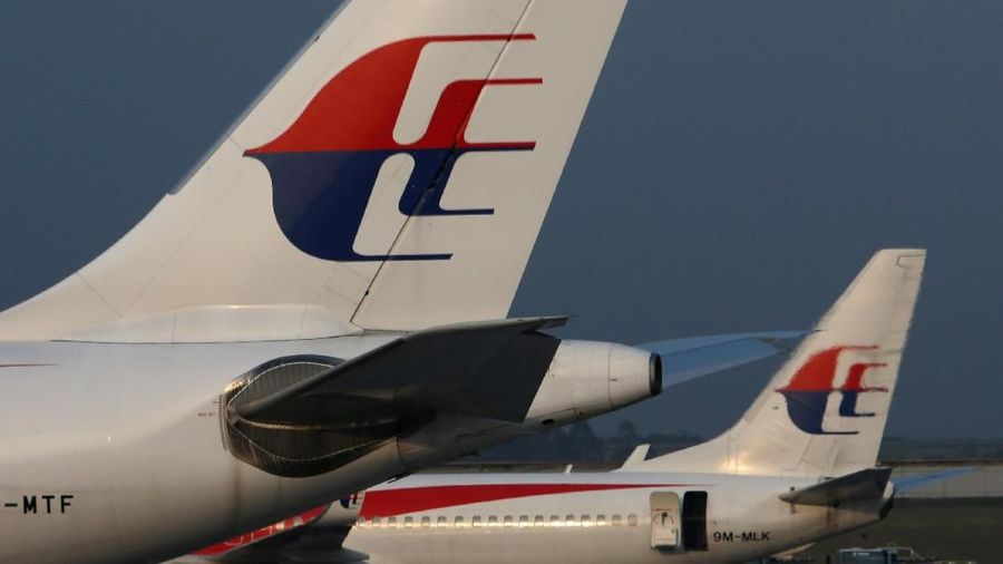 FILE PHOTO: Malaysia Airlines planes sit on the tarmac at Kuala Lumpur International Airport July 21, 2014. REUTERS/Edgar Su