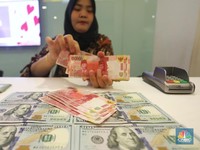 Pukul 12:00 WIB: Rupiah Masih Menguat 0,1% ke 14.440/US$