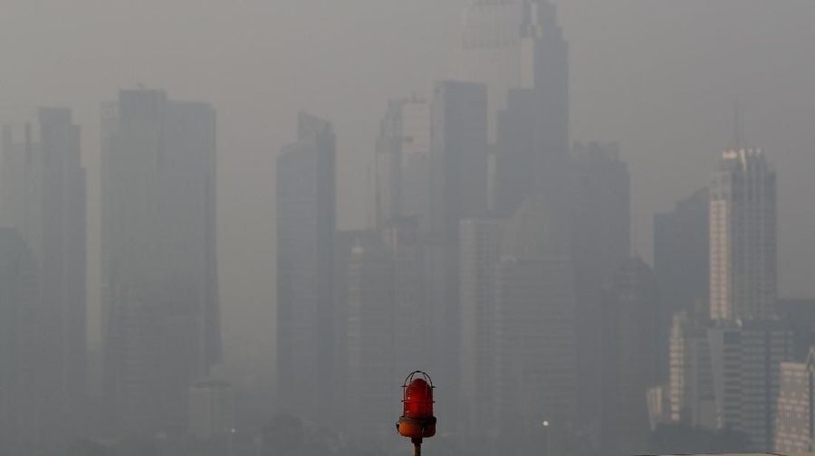 Aerial view of advertisement board as smog covers Jakarta ahead of Asian Games, Indonesia, July 27, 2018. The board reads 