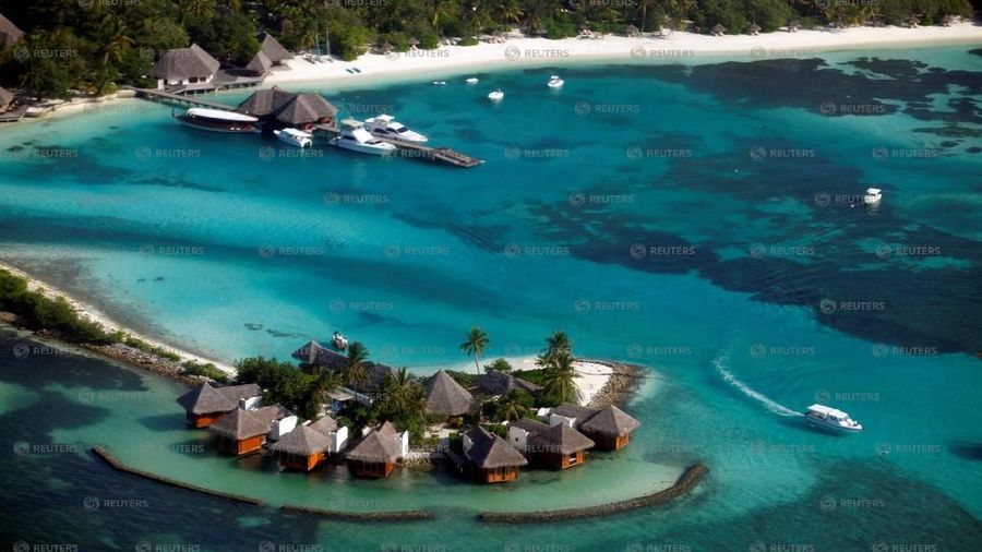 An aerial view shows a resort island at the Male Atoll December 7, 2009. REUTERS/Reinhard Krause/File photo