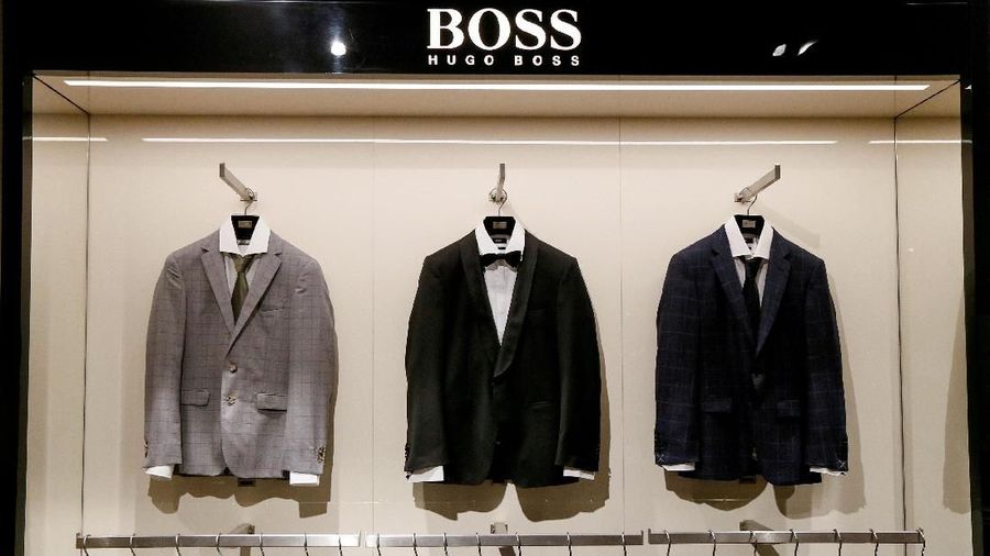 FILE PHOTO: Jackets are on display in the Hugo Boss section in the Central Universal Department Store (TsUM) in Kiev, Ukraine, May 17, 2017. REUTERS/Valentyn Ogirenko/File Photo GLOBAL BUSINESS WEEK AHEAD