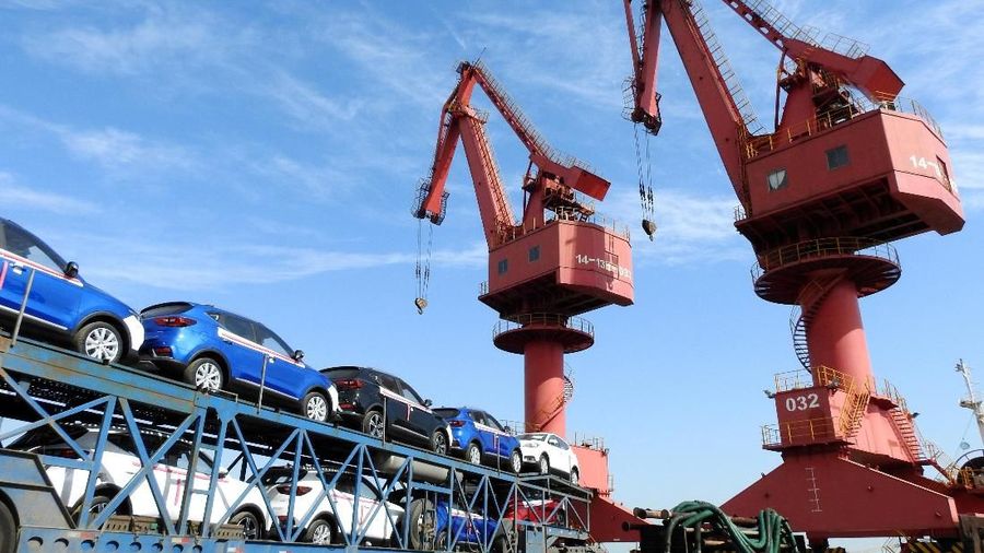 FILE PHOTO - Cars to be exported are seen at a port in Lianyungang, Jiangsu province, China May 31, 2018. REUTERS/Stringer/File Photo  ATTENTION EDITORS - THIS IMAGE WAS PROVIDED BY A THIRD PARTY. CHINA OUT. GLOBAL BUSINESS WEEK AHEAD