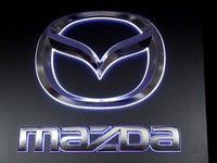 FILE PHOTO The logo of Mazda Motor Corp. is displayed at the company's news conference venue in Tokyo, Japan May 11, 2018. REUTERS/Kim Kyung-Hoon/File Photo
