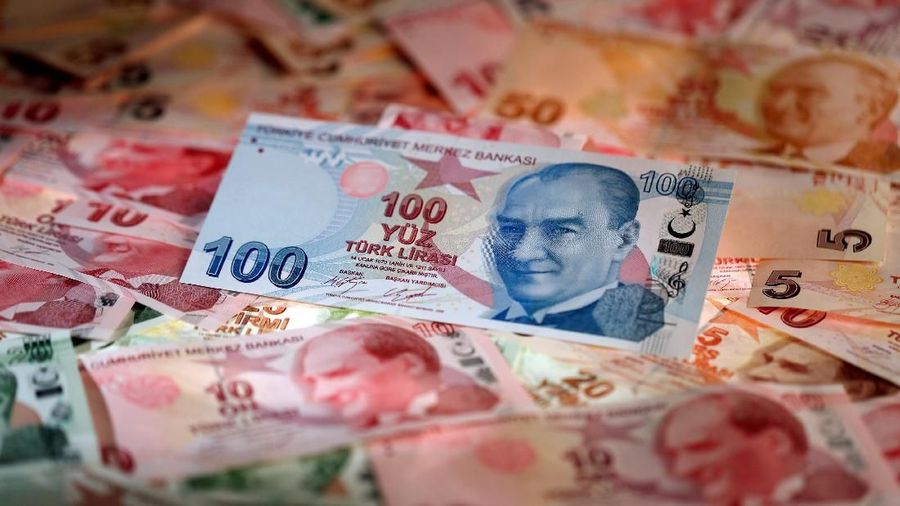 FILE PHOTO: FILE PHOTO: Turkish Lira banknotes are seen in this October 10, 2017 picture illustration. REUTERS/Murad Sezer/File Photo/File Photo