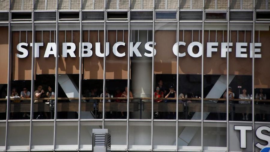 The signboard of Starbucks coffee is pictured at its branch in Tokyo, Japan August 13, 2018. REUTERS/Kim Kyung-Hoon