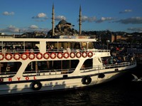 People travel on a ferry over the Bosphorus in Istanbul, Turkey August 11, 2018. REUTERS/Umit Bektas