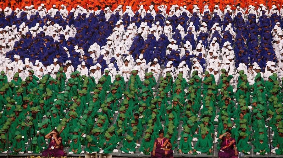 Schoolchildren listen as Indian Prime Minister Narendra Modi (not pictured) addresses the nation during Independence Day celebrations at the historic Red Fort in Delhi, India, August 15, 2018. REUTERS/Adnan Abidi