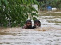 FOTO: Duka di Tengah Banjir Kerala