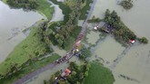 Foto dari udara memperlihatkan sebagian besar wilayah Kerala tenggelam oleh banjir, Minggu (19/8).
