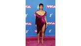 Cardi B sukses menggebrak MTV VMA 2018 dengan gaya busananya yang super seksi sekalipun dia baru saja melahirkan putri pertamanya beberapa waktu lalu. (REUTERS/Andrew Kelly)