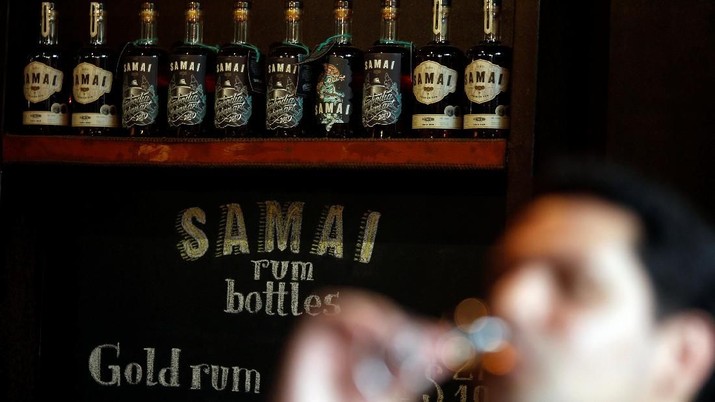 CEO and Director, Antonio Lopez de Haro sips a rum at the Samai Distillery in Phnom Penh, Cambodia, August 16, 2018. Picture taken August 16, 2018. REUTERS/Samrang Pring