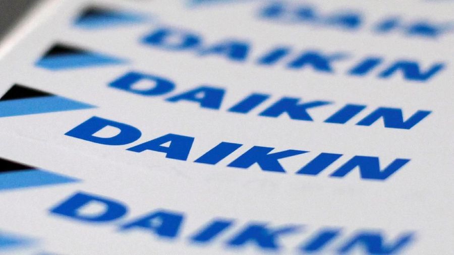 FILE PHOTO: The logos of Daikin Industries Ltd are seen at the company's office in Tokyo August 29, 2012.   REUTERS/Toru Hanai/File Photo
