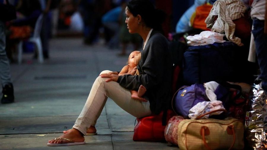 Para imigran banyak yang tinggal di tenda-tenda darurat yang merupakan kamp sementara bagi pengungsi Venezuela.