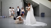 Setidaknya ada 3.000 pasangan dari seluruh dunia mengikuti upacara pernikahan massal di Korea Selatan. (REUTERS/Kim Hong-Ji)