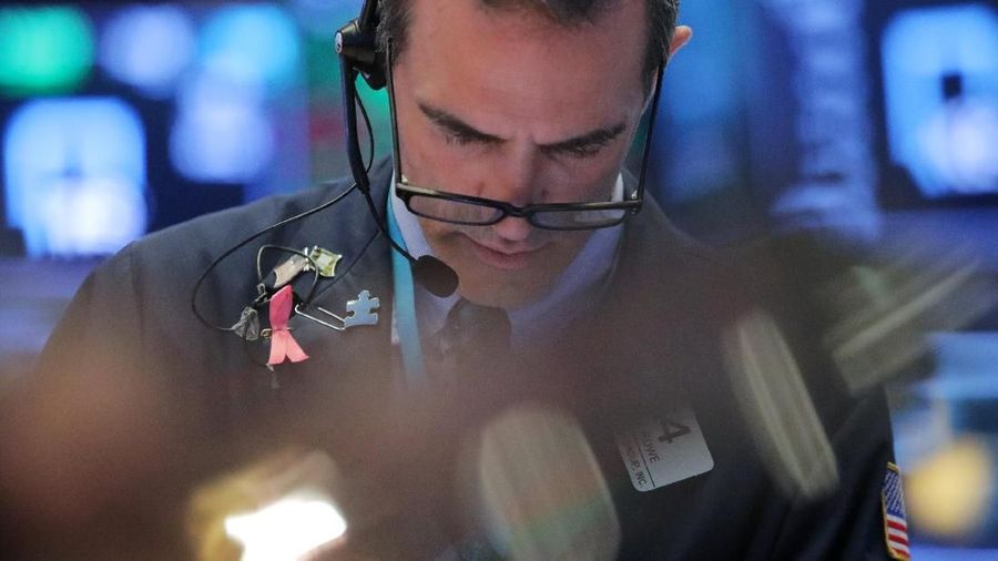 Traders work on the floor at the New York Stock Exchange (NYSE) at the end of the day's trading in Manhattan, New York, U.S., August 27, 2018. REUTERS/Andrew Kelly