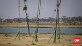 Rawa Rorotan jadi sorotan setelah Kadis Sumber Daya Air DKI Teguh Hendrawan ditetapkan tersangka atas laporan perusakan dari seseorang yang disebut pemilik lahan di sana. Suasana pengerjaan proyek Waduk Rawa Rotan, Cakung, Jakarta, 30 Agustus 2018. (CNNIndonesia/Adhi Wicaksono)