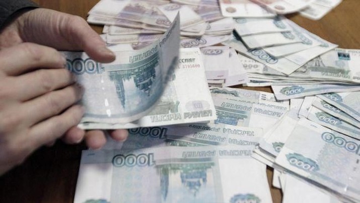 Mata uang Rubel Rusia. (REUTERS/Eduard Korniyenko)