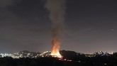 Kebakaran ini dikhawatirkan menghancurkan lebih dari 20 juta koleksi seni yang disimpan di salah satu museum tertua di Brasil itu. (Tania Dominici/via REUTERS)