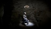 Bungker itu kembali menjadi tempat mereka berlindung ketika satu jet pemerintah menembakkan gas sarin ke Khan Sheikhoun di Idlib, menewaskan lebih dari 80 warga sipil. (Reuters/Khalil Ashawi)